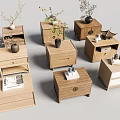 Wooden Bedside Tables in Various Styles With Drawers Flower Vases And Books On Top