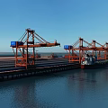 Spacious Industrial Plant Area With Red Cranes Blue Sky Water View And Rail Tracks