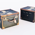 Two Vintage Dark Green Trunks With Decorative Patterns Metal Latches And Tags