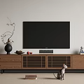 Wooden TV Stand with Decorative Vase Ornaments Cat Figurine and Books in Living Room