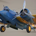 Blue And Yellow Twin Engine Fighter Jet With American Stars And Stripes Insignia