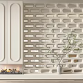 Elegant Modern Room Divider With White Perforated Design And Green Plant Decor