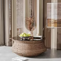 Elegant Round Wicker Coffee Table with Glass Top Fruits Vase Dried Plants and Books