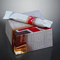 Delicious Chocolate Bar With White Wrapper And Red Gold Accents Placed On Textured Silver Box