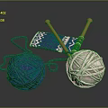 Knitting Supplies With Blue Pink Yarn Balls Wooden Needles And Blue Patterned Fabric
