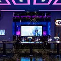 Modern KTV Interior Design With Purple Lighting Large Screens And Comfortable Sofas 3d model