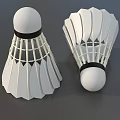 Two White Badminton Shuttlecocks With Feather Structure And Black Rubber Heads