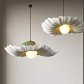 Elegant Petal Shaped Chandeliers With White Petals Yellow Bulbs And Green Center