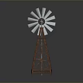 Vintage Windmill Model With Metal Blades And Wooden Tower Structure