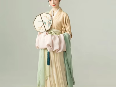 Traditional Hanfu Attired Woman Holding Decorative Fan in Gentle Setting 3d model