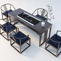 Traditional Chinese Wooden Tea Table and Chairs With Blue Cushions Tea Set And Vase Plants