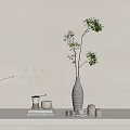 Stylish Home Decor Setup With Green Plant In Gray Vase And Candles