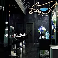 Modern Milk Tea Shop Interior With Space Theme Decor And Robot Ornaments