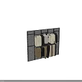 Hanging Clothes In Various Colors With Tops And Pants Neatly Displayed