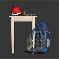 Man Packing Work Gear With Red Safety Helmet Black Water Bottle Tools And Backpacks On Table