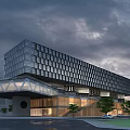 Modern Commercial Street Building With Glass Curtain Walls And Illuminated Evening Landscaping Trees