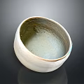 Hand Carved Ceramic Bowl With Textured Surface And Simple Artisan Design