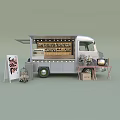 Silver Mobile Café Truck Serving Coffee and Pie with Open Side Table TV and Flowers