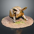 Bronze Rabbit Sculpture in Crouching Position on Circular Base with Grass and Dirt Details