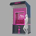 Pink And Black Claw Machine With Illuminated Design And Pink Balls For Entertainment