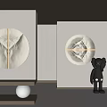 Circular Illuminated Abstract Paintings In Modern Minimalist Interior With Black Figurine And White Spherical Decor