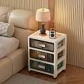 Modern Bedside Table With Drawers Near Beige Sofa Bed And Table Lamp Radio