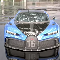 Bugatti Blue Sports Car With Open Doors Black Roof Rear Spoiler And Reflective Surface