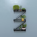 Z Shaped Metal Wall Cabinet Mounted On Gray Wall With Green Plants And Yellow Container