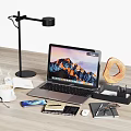 Modern Workspace Desk Setup With Laptop Desk Lamp Coffee Cup Donut Notebook Mouse And Glasses