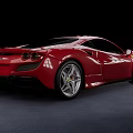 Red Ferrari Sports Car With Sleek Aerodynamic Design And Shiny Alloy Wheels