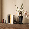 Decorative Accessories Set With Books Black Vase Pink White Flowers On Wooden Console Table