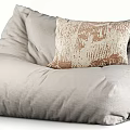 Beige Bean Bag Chair With Textured Fabric And Decorative Patterned Pillow 3d model