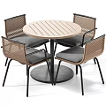 Round Wooden Table And Four Woven Chairs Set With Black Metal Frames And Gray Cushions