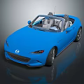 Blue Mazda Convertible With Modern Sporty Design Open Top And Black Wheels