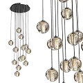Modern Chandelier With Multiple Transparent Glass Balls And Black Hanging Cords For Interior Decor
