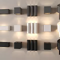 Modern Wall Lamps with Various Shapes and Black White Designs Illuminated on Wall