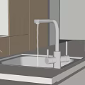 Modern Bathroom Sink Featuring Stainless Steel and Flowing Faucet on Dark Countertop with Light Cabinets