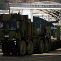 Military Camouflage Transport Truck With Multiple Wheels At Fort Zandubo AI Military Base