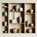 Ceramic Vessels Display On Wooden Shelves With Various Shapes And Textured Surfaces