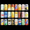 Colorful Beverage Cans Display With Various Brands And Diverse Flavors On Black Background