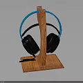 Stylish Wireless Headphones With Blue Headband And Black Earpads On Wooden Stand