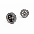 Stylish Automotive Tires With Black Alloy Wheels And Modern Spoke Design