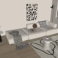 Modern Three Seater Sofa With Checkered Pillow Brown Round Cushion Abstract Art And Floor Lamp