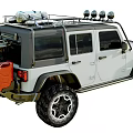 White Jeep Rubicon Off Road Vehicle With Roof Rack Roof Lights And Large Tires