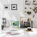 Modern Workspace Setup With Office Supplies Green Plant Coffee Cup And Wall Decor