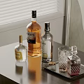 Various Alcohol Bottles And Drinking Glasses Placed On Table With Tray Near Window Blinds
