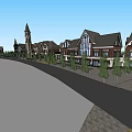 Traditional And Modern Buildings On Commercial Street With Outdoor Seating And Street Lamps