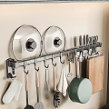 Wall Mounted Kitchen Organizer With Pot Lids Utensils Frying Pan And Cutting Board