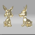 Two Golden Cartoon Rabbit Figurines Sitting Facing Each Other