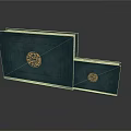 Dark Blue Covered Books With Golden Circular Pattern On Front Large And Small Sizes